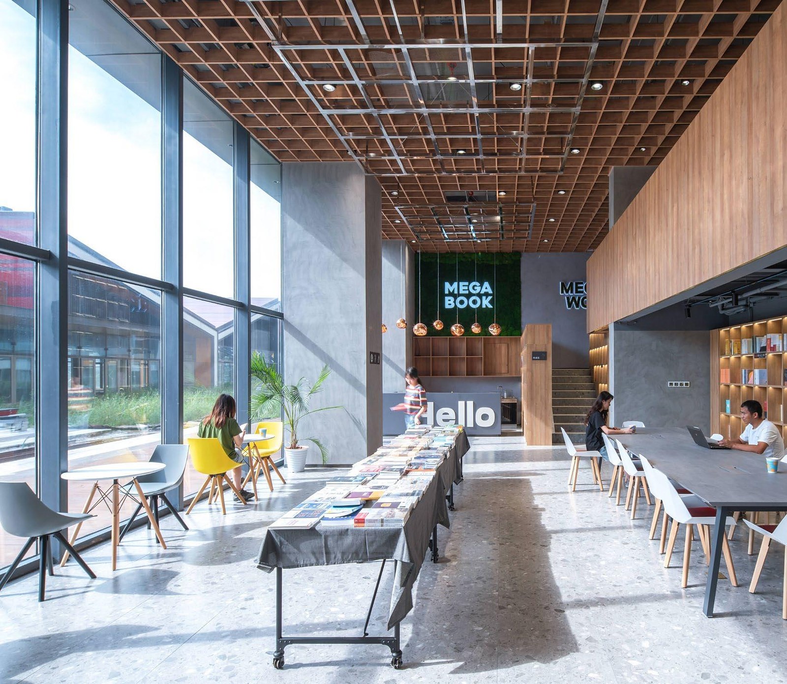 BE DESIGN international cultural interior reference with timber ceiling and reading tables